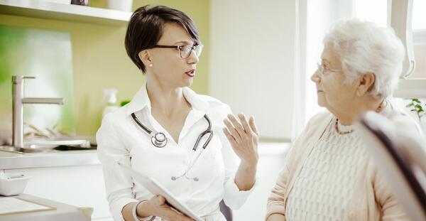 Doctor talking with patient